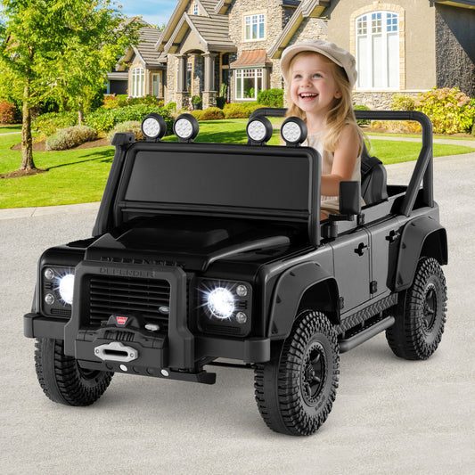 Licensed Land Rover Defender 12V Ride On Toy Car, the kids electric car parked on a driveway in front of a house with a happy