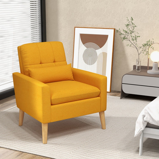 The yellow accent chair placed in a bedroom setting next to a bedside table and bed