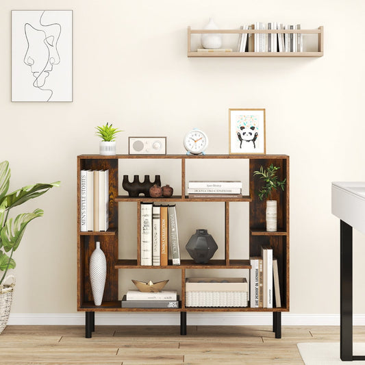 The geometric bookcase styled in a living room with plants and pictures on the wall