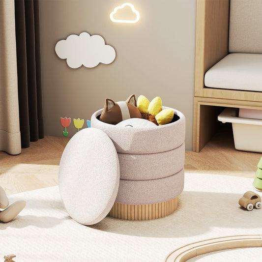 Beige fabric storage ottoman with lid open, showing toys inside, in a child's room