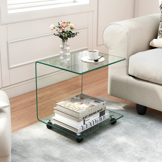 The glass side table in a lounge, with books and a coffee cup on the top shelf