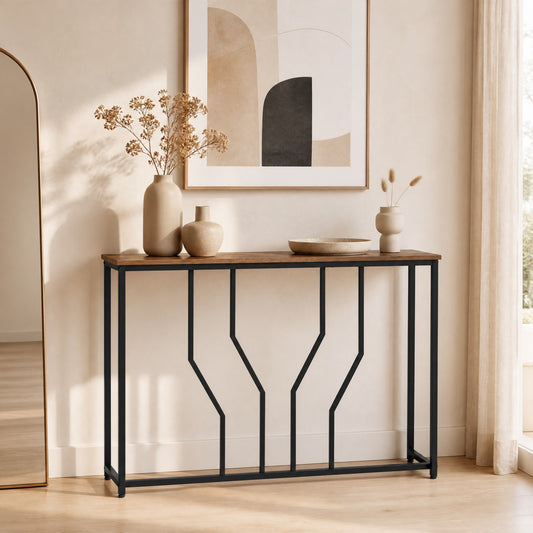 Rustic brown console table with a geometric black metal frame in a living room setting