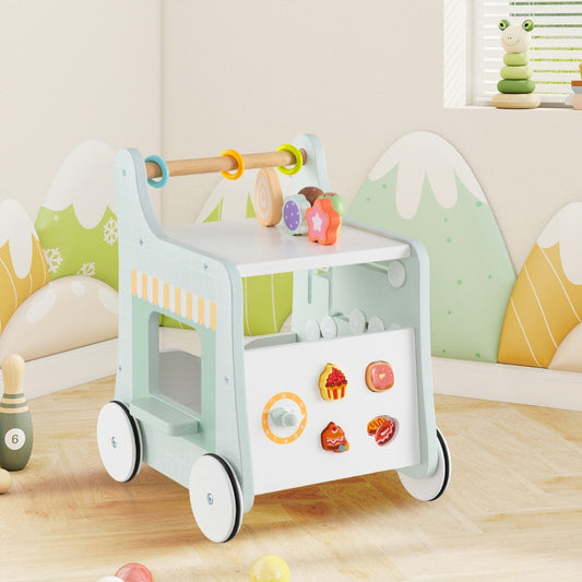 The green baby walker has a cart design with toy ice cream and donuts attached