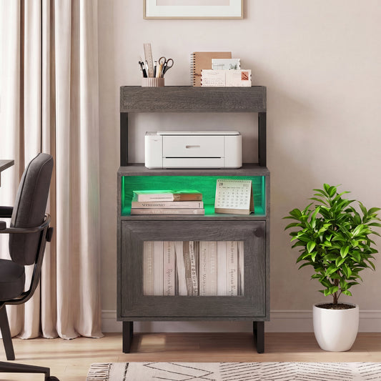 The nightstand placed in a home office setting with a printer on the shelf and green interior light