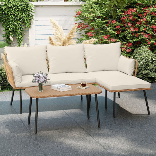 The white outdoor L shape sofa set with a coffee table on a patio