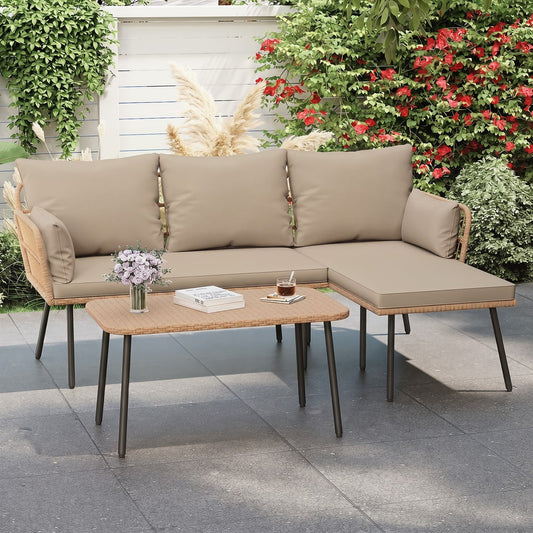 The brown outdoor L shape sofa set with a coffee table on a patio with plants