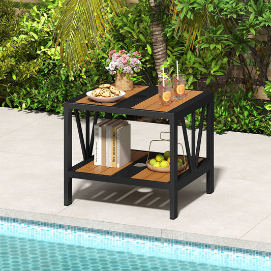 The patio table placed on a tiled poolside patio with snacks and drinks
