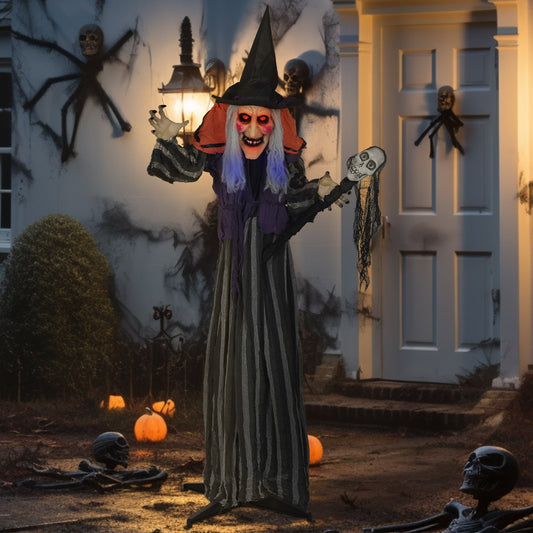 The Halloween witch decoration placed outside a house at night with spooky elements