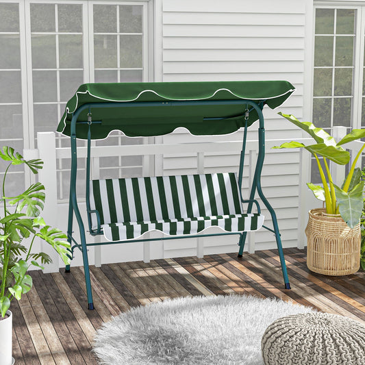 The swing chair placed on a wooden deck with potted plants and a white rug nearby