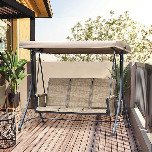 The three seater garden swing seat placed on a wooden balcony with potted plants
