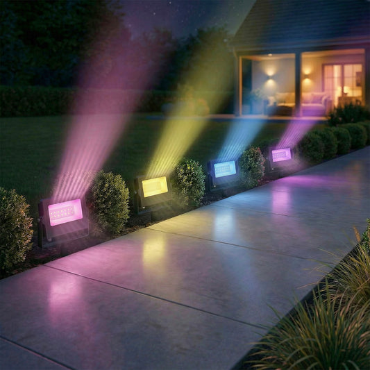 The garden lighting illuminating a patio path with various vibrant coloured light beams