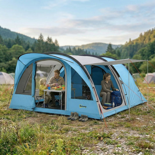 The family camping tent set up in a grassy field with a family sitting inside the living area