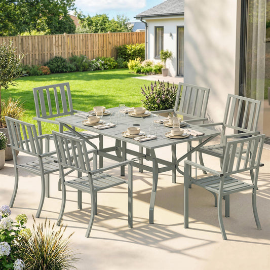 The light grey garden dining set with six chairs around a table on a patio