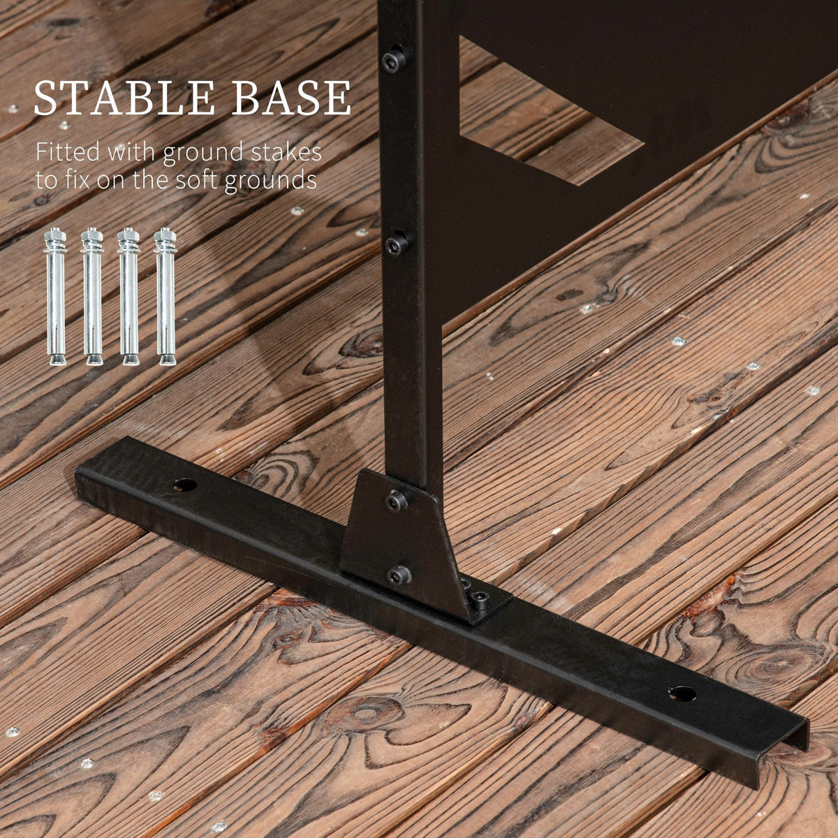 Close-up of the stable base of the outdoor divider, showing ground stakes for fixing