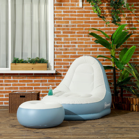 The inflatable chair and footstool set placed on a wooden patio against a brick wall