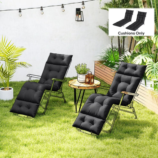 The sun lounger cushions placed on outdoor metal chairs in a garden setting with a small table