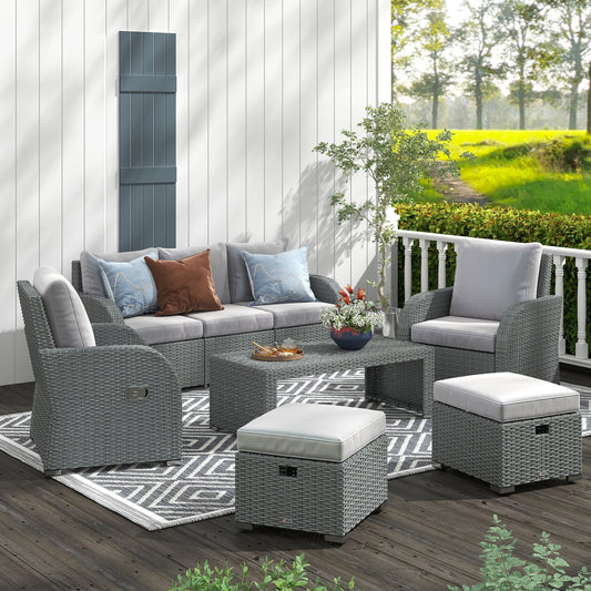 The outdoor rattan dining set arranged on a patio with decorative cushions and a vase of flowers