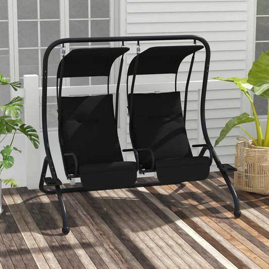 The black two-seat garden swing chair on a wooden deck with plants