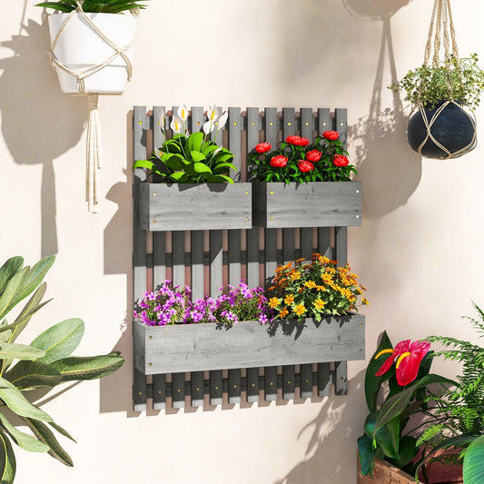 The wooden garden planters with trellis in a garden setting with hanging plants