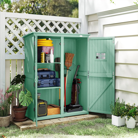 The garden shed with both doors open, showing tools and cleaning supplies stored inside