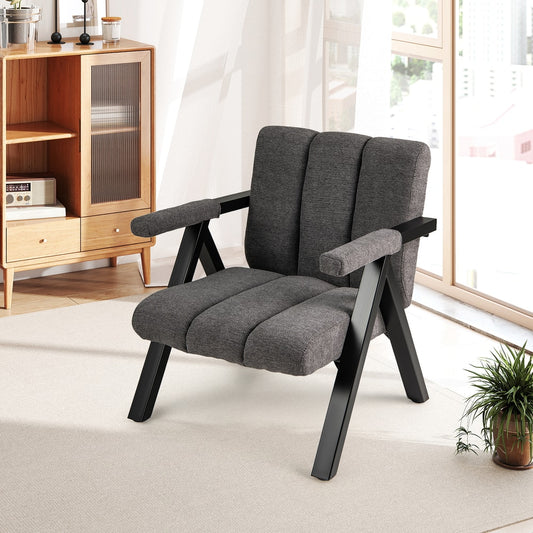 The grey upholstered accent chair placed in a modern living room setting