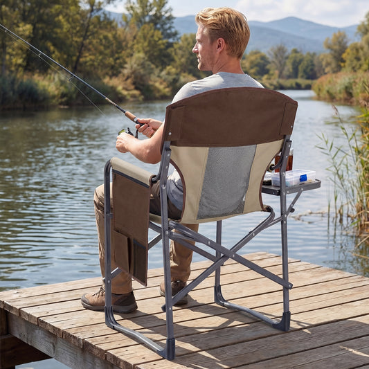 The camping furniture being used by a man fishing on a wooden pier by a river