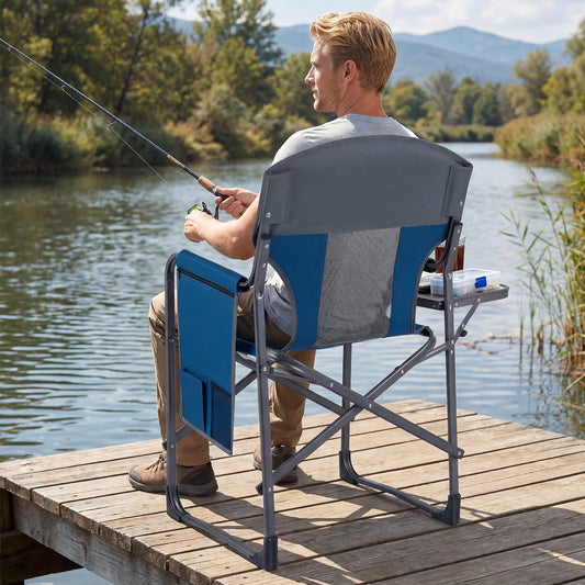 The camping furniture being used by a man fishing on a wooden pier by a river