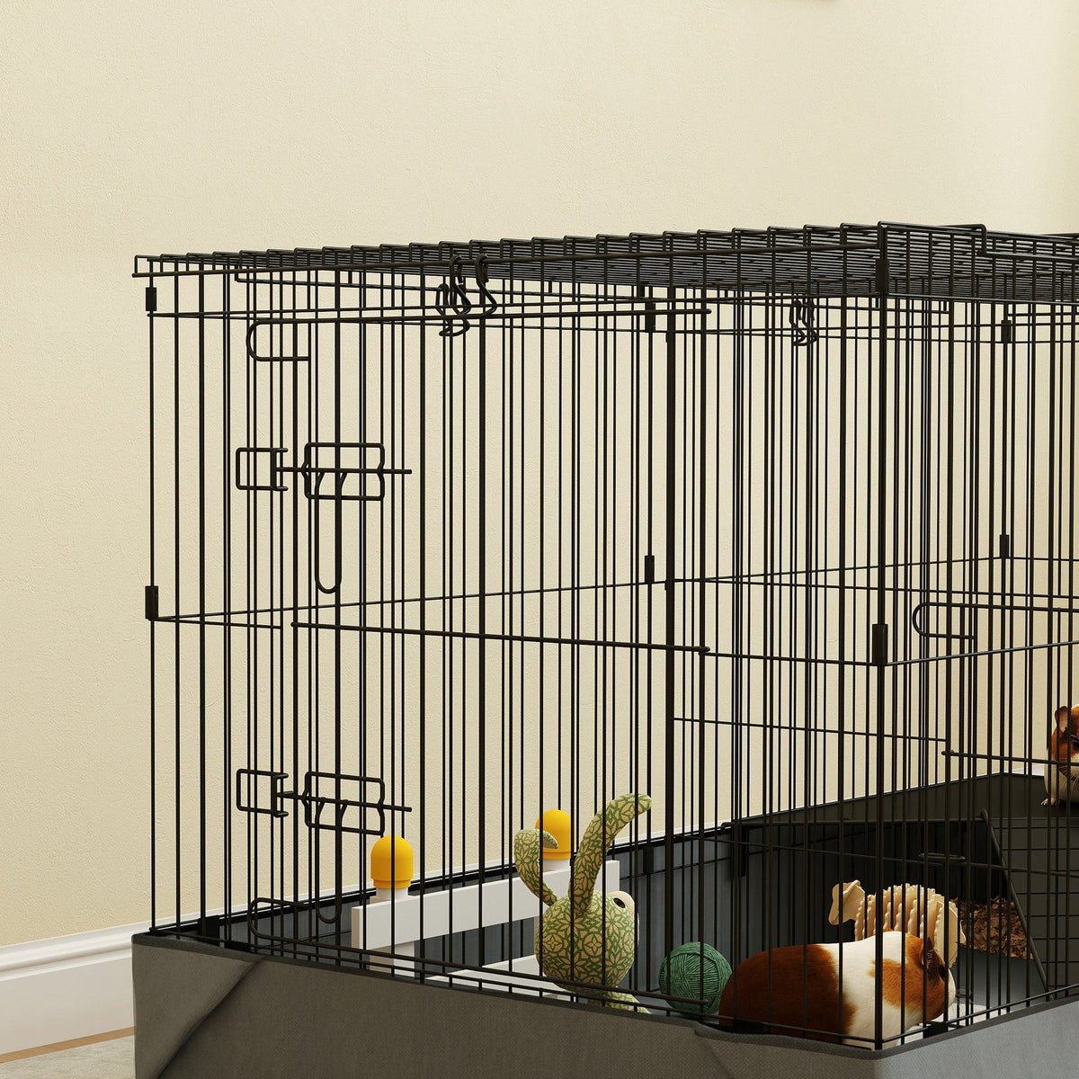 The small animal cage showing a close-up of the wire door and side wall construction