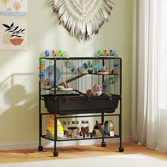 The hamster cage standing in a bright living room with pet supplies on the bottom shelf