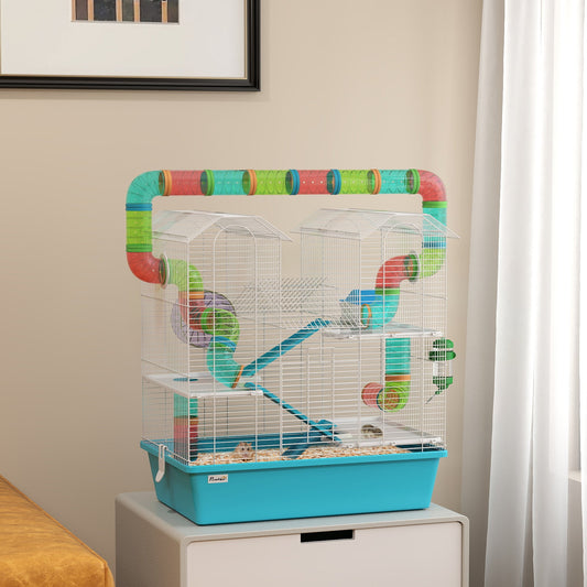 The light blue hamster cage with tubes set up in a room with a window and furniture