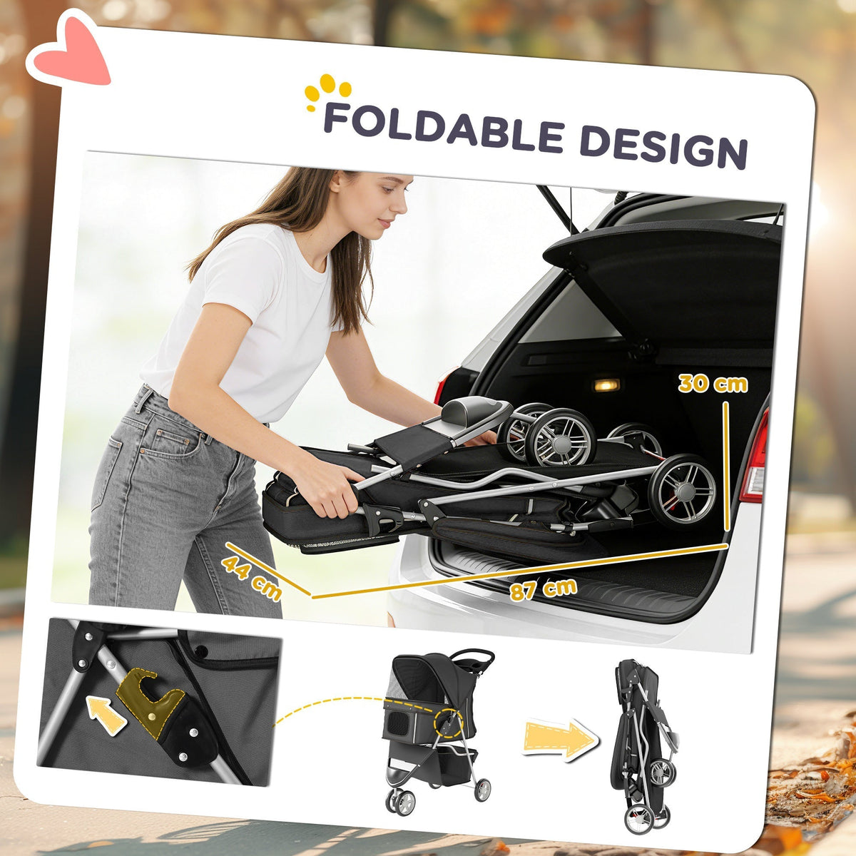 A woman folds a dark grey dog stroller and places it into the boot of a car