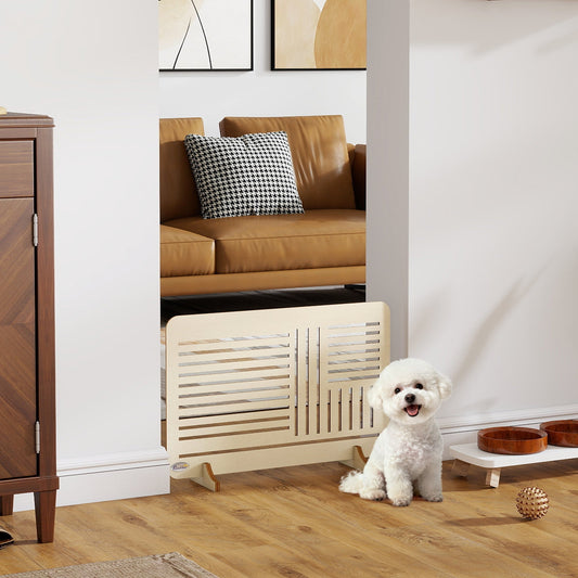 The portable dog barrier gate is set up in a living room, with a small white dog sitting in front of it
