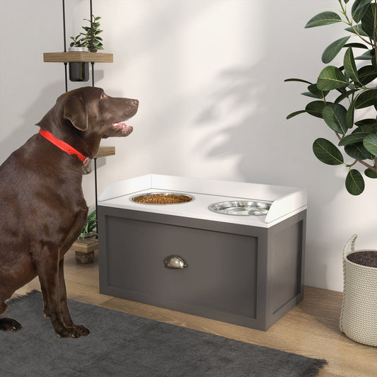 A large brown dog eating from the raised dog bowls in a bright room