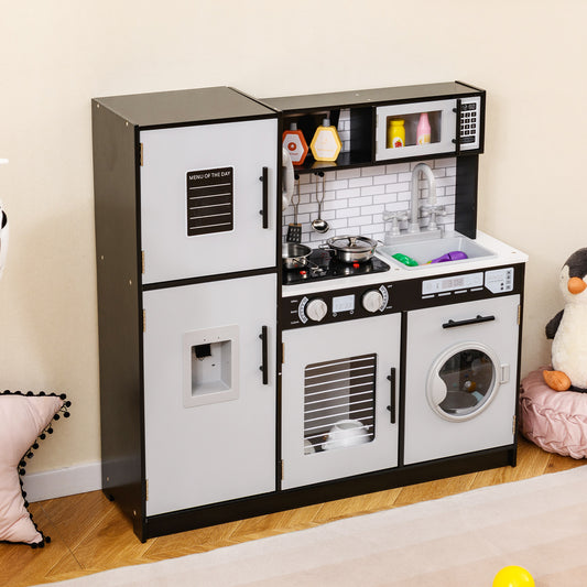 The black and white play kitchen set with oven and washing machine