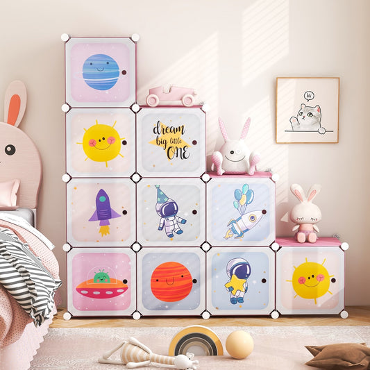 The pink children's wardrobe with 12 cubes and 2 hanging sections, featuring space designs
