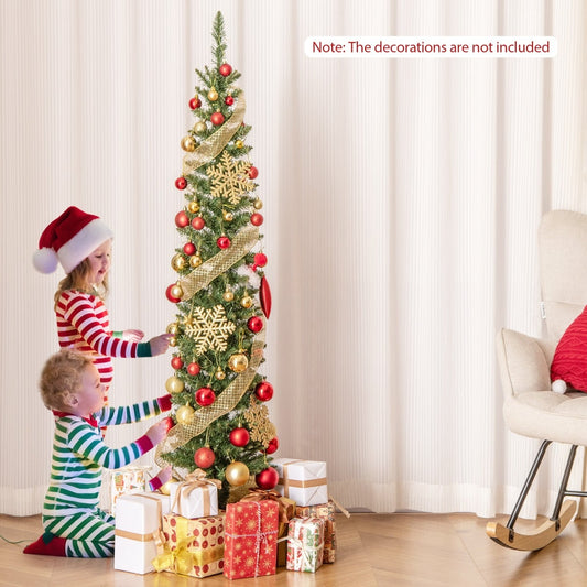 Two children decorating the slim Christmas tree with baubles and a ribbon