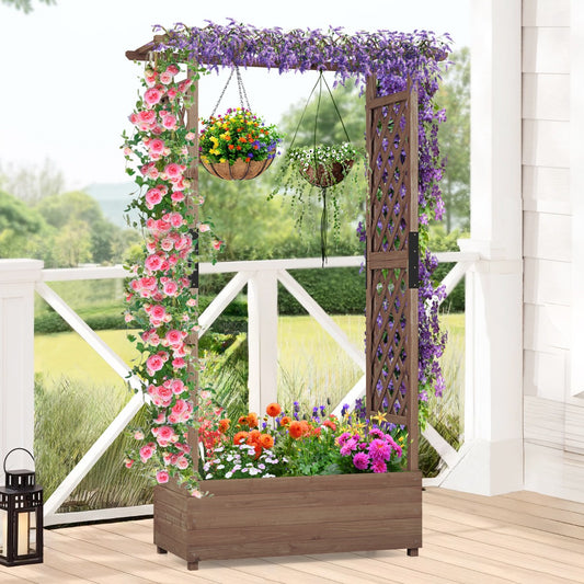 The wooden planter box is filled with colourful flowers and hanging baskets, set on a patio