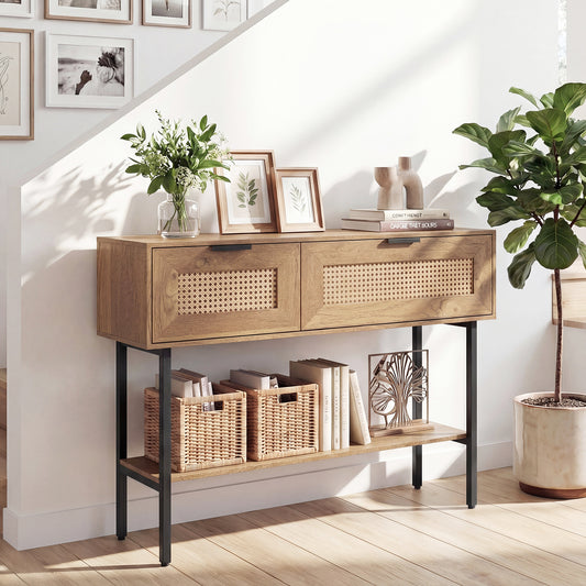 Boho entryway table with cane flip doors and a lower shelf, styled with books and baskets