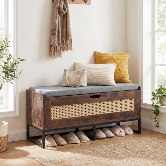 The shoe bench with storage in a hallway setting, with shoes below and cushions on top