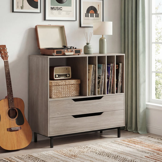 The grey record player stand in a room with a turntable, guitar, and records