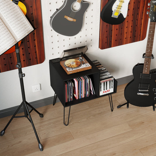 The black record player stand with power outlet and removable dividers shown in a room with musical instruments and decor