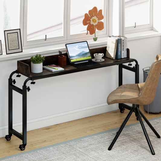 The rolling computer desk positioned against a wall with a chair underneath
