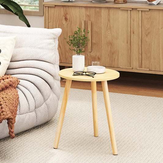 The small side table is placed next to a sofa in a living room setting