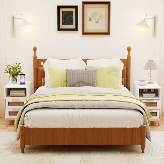 Two white nightstands in a bedroom on either side of a bed