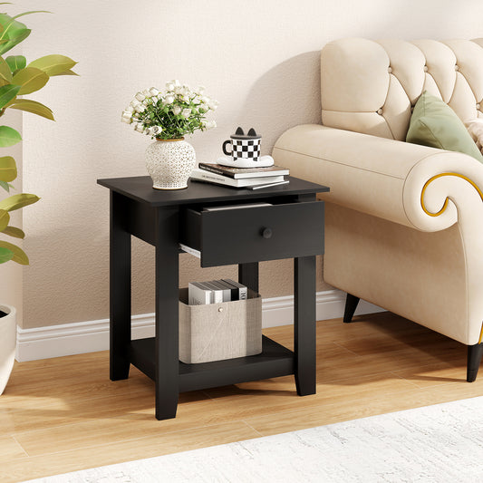 Black bedside table with an open drawer and a shelf below, shown with a vase and books