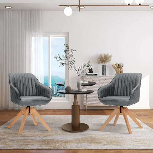 Two grey swivel accent chairs in a modern living room setting