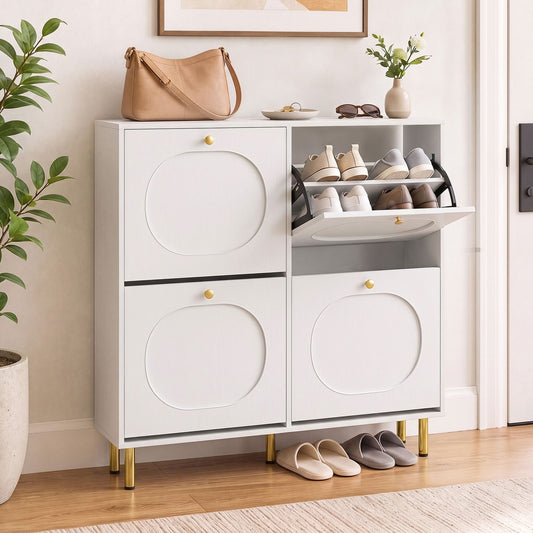 White shoe storage cabinet with four flip drawers and shoes inside, placed in an entryway