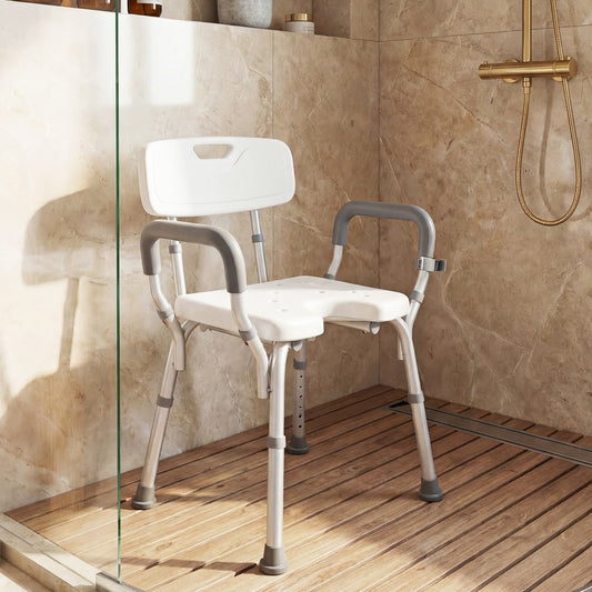 The bath safety chair shown inside a modern shower cubicle with wooden effect flooring
