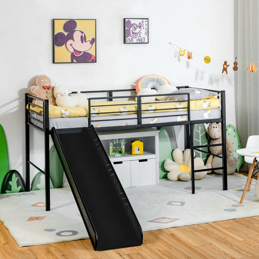 The children's loft bed in black, set up with bedding and a slide