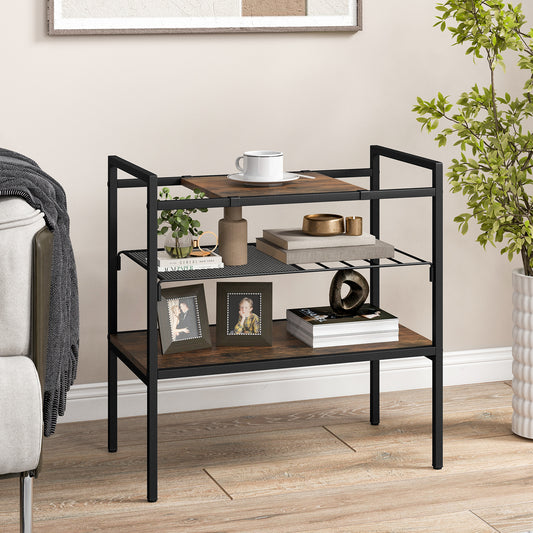 The side table styled in a living room with books, photo frames and a coffee cup on the shelves